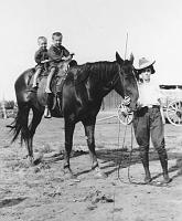  Edith Speed (daughter of Charlie Speed and Mary Moore Speed) with horse, Prince, and Turner brothers, Wesley and Lester Turner.